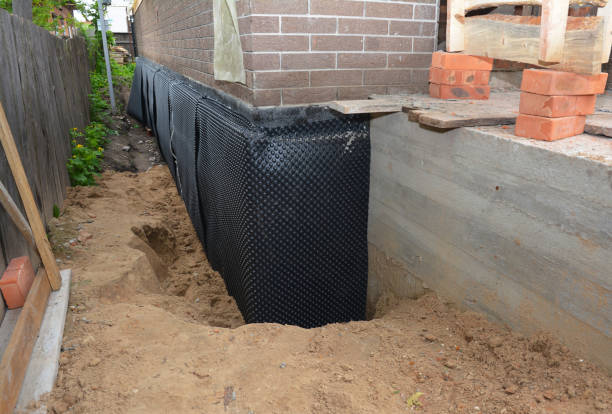 Happy homeowners after waterproofing job in Leonia